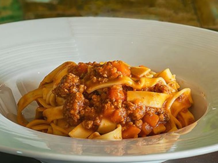 Homemade pappardelle with meat sauce